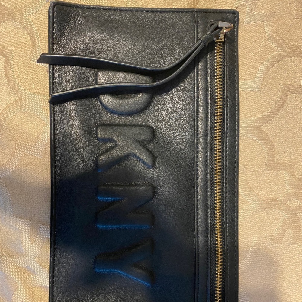 DKNY leather clutch (gently used)